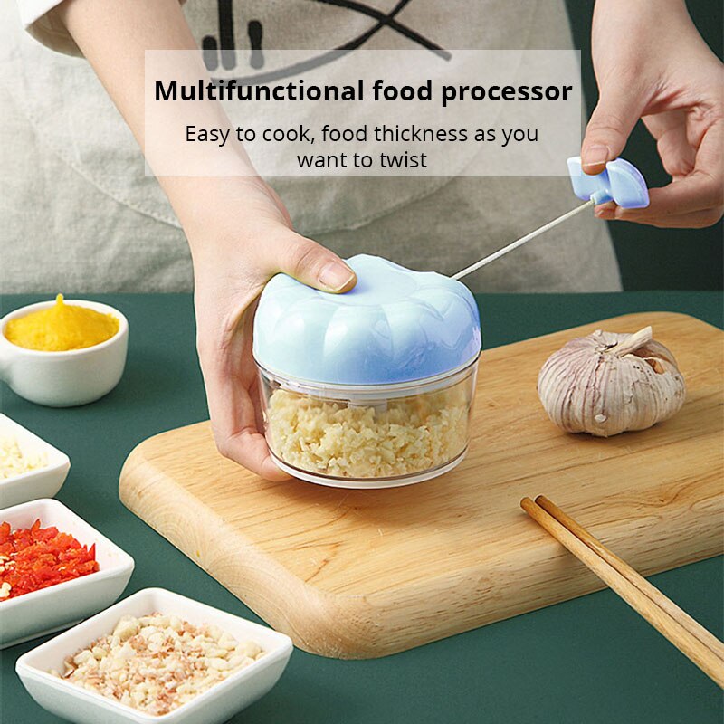 Kitchen Hand Gadgets - Presse-ail manuel bleu/rose, 1 pièce, traction