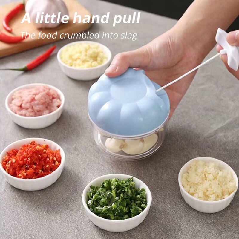 Presse-ail manuel bleu/rose, 1 - Kitchen Hand Gadgets avis et prix